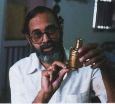 Vilas Karandikar and miniature bumba (copper water boiler)